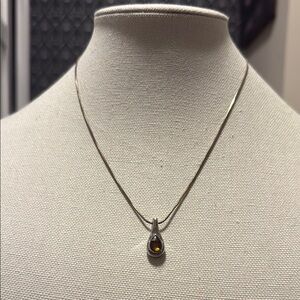 Korite Ammolite faceted green and amber gemstone